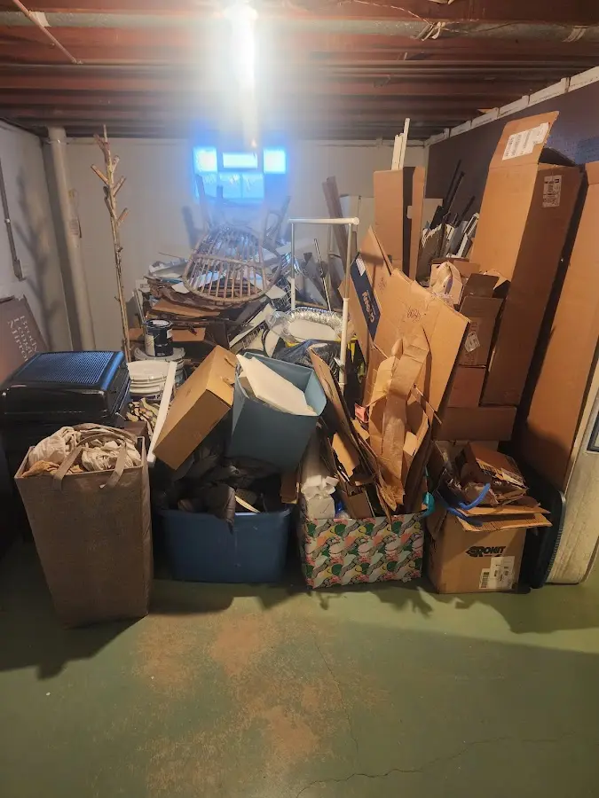 Roll-off dumpster container at job site for Yard Waste Dumpster Rental in Olney